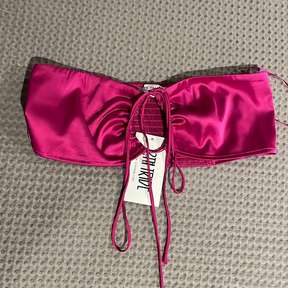 a fuchsia crop top